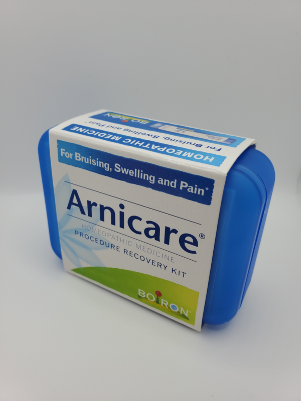 a box of armicare on a white surface.